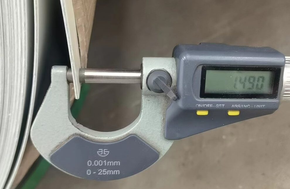 Digital micrometer measuring coil thickness